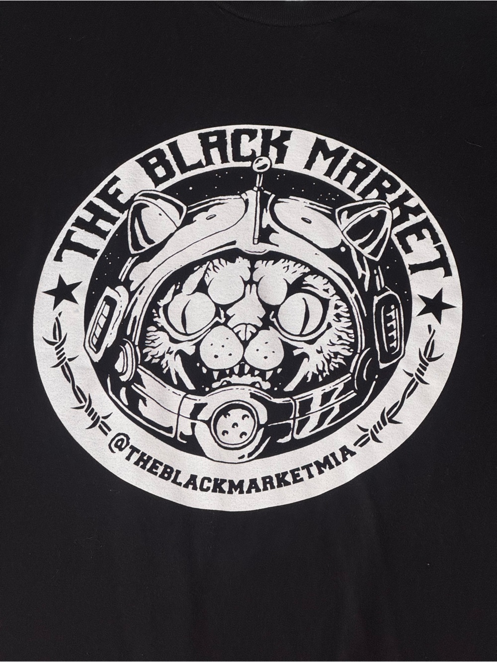 The Black Market Miami Black Short Sleeve Tee with White Cat Astronaut Graphic - Picture 4 of 4